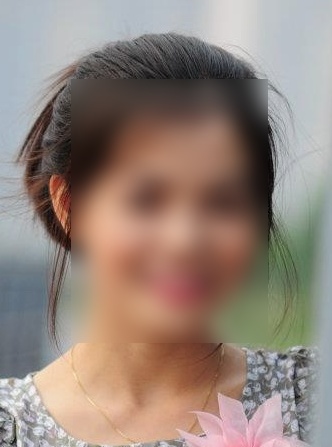 Face blurred.